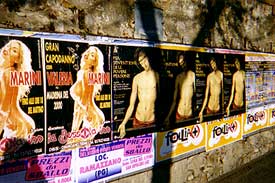 The Sacred and the Profane, sharing the same wall in Panicale, Umbria.