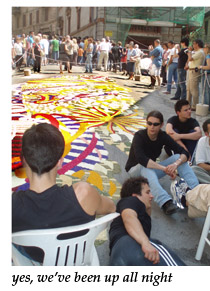 tired flower arrangers of Spello, Italy during Corpus Domini celebration