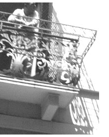 balcony street watcher in Spello, Italy during corpus domini celebration