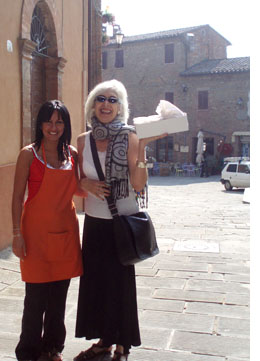 Kiki and Fabiola in Panicale's Piazza with some Italian cappucchino to go
