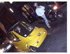 tiny yellow car in Florence, Italy